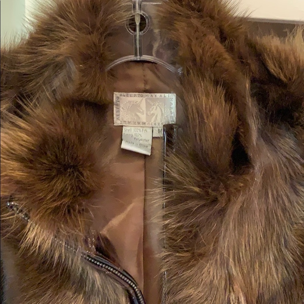 Jacket with fur and a type of plastic embossed